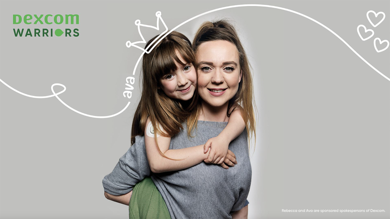 A little girl is having a piggy back from her mum.