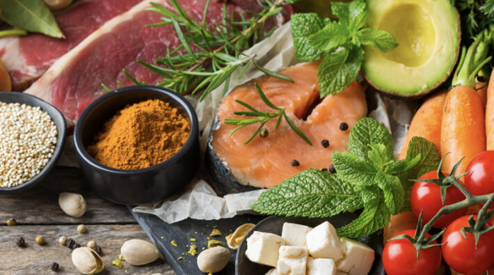 Steak, salmon, carrots, avocado, tomatoes, feta cheese, tumeric, seeds and nuts