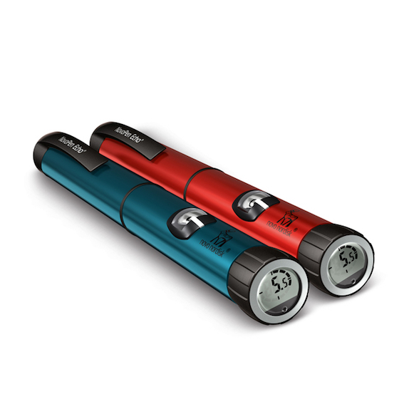 2 connected pens next to each other