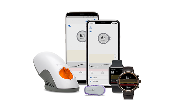 A sensor applicator, a CGM, two phones and two smart watches.