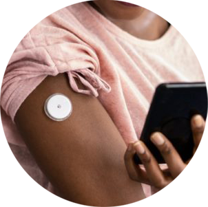 A person is monitoring glucose with a glucose monitor