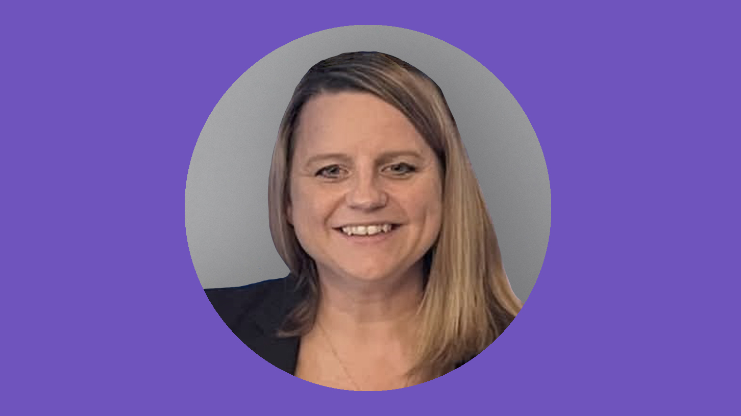 A woman smiling at camera