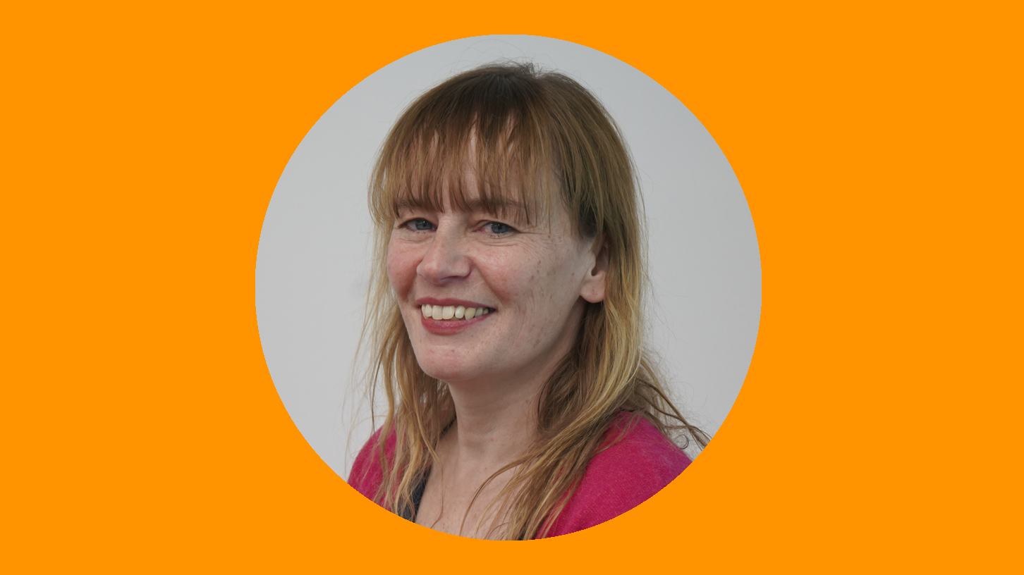 A woman smiling at the camera