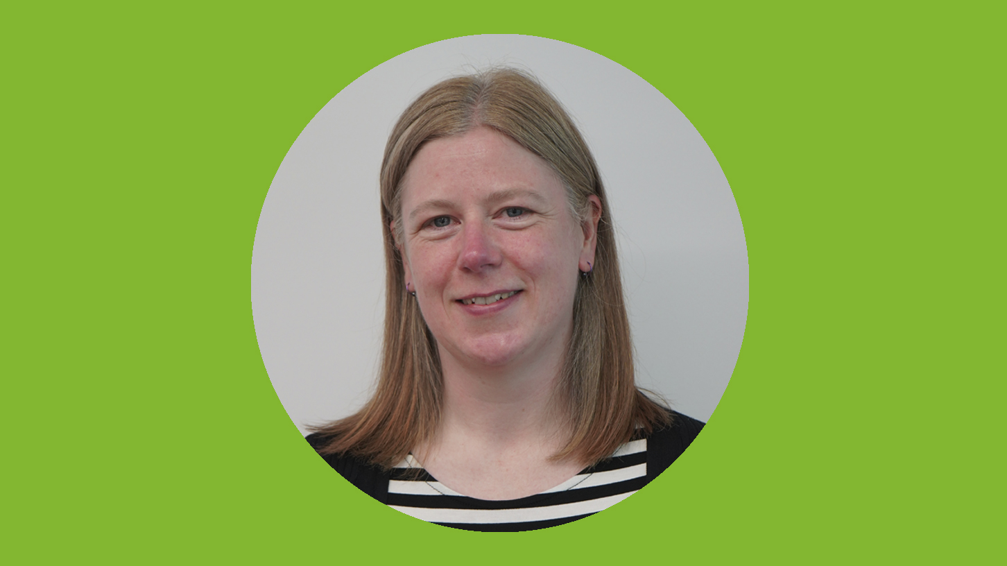 A woman smiling at the camera