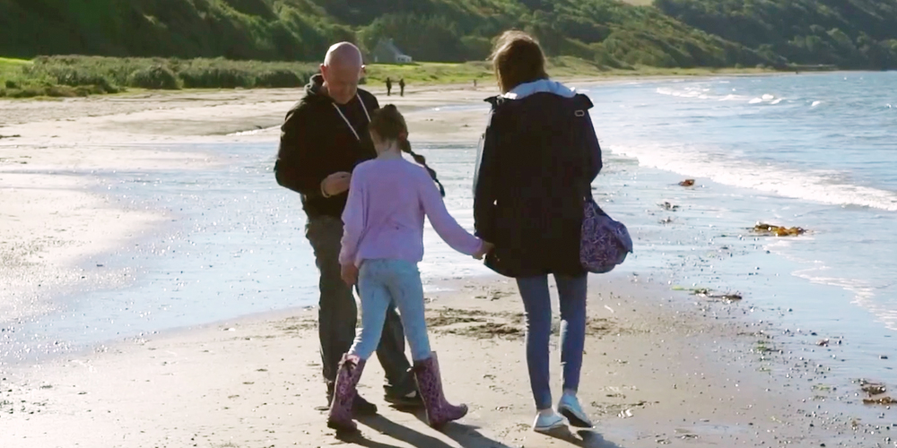 A happy family on the beach